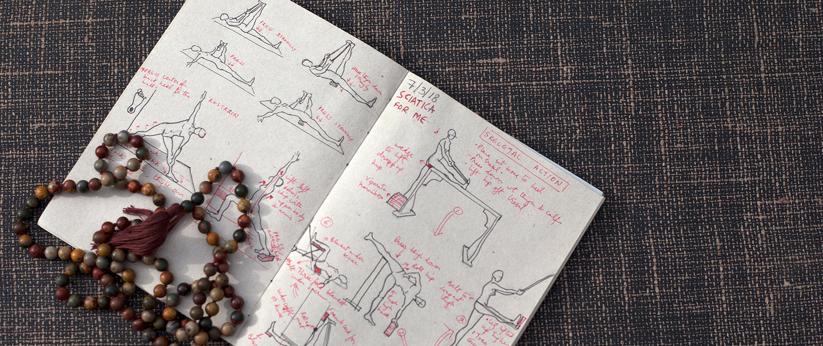 Book with Yoga Poses and Beads on Proyog Jute and Rubber Mat