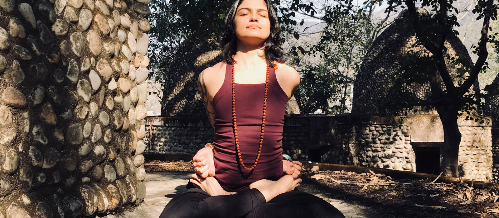 Fareena Farid in Proyog Red Yoga Racerback Tank Top and Black Pants