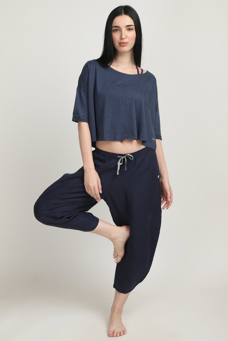 Woman in 100% Linen Navy Pants and Crop Top