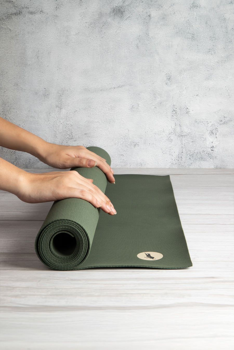 Mysore Mat rolled up, a pure natural rubber yoga mat that is compact and portable
